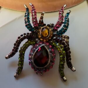 Pink and Green Crystal Ring with Intricate Detailing